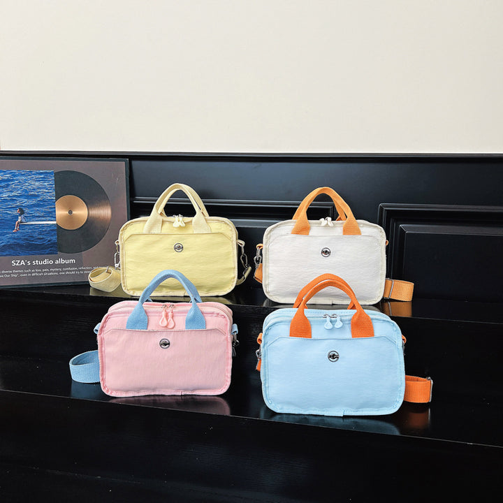 Tote bag with adjustable shoulder strap and extra storage Bowlift