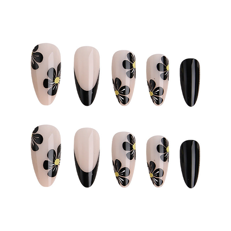 Elegant nail tips with floral accents Bowlift