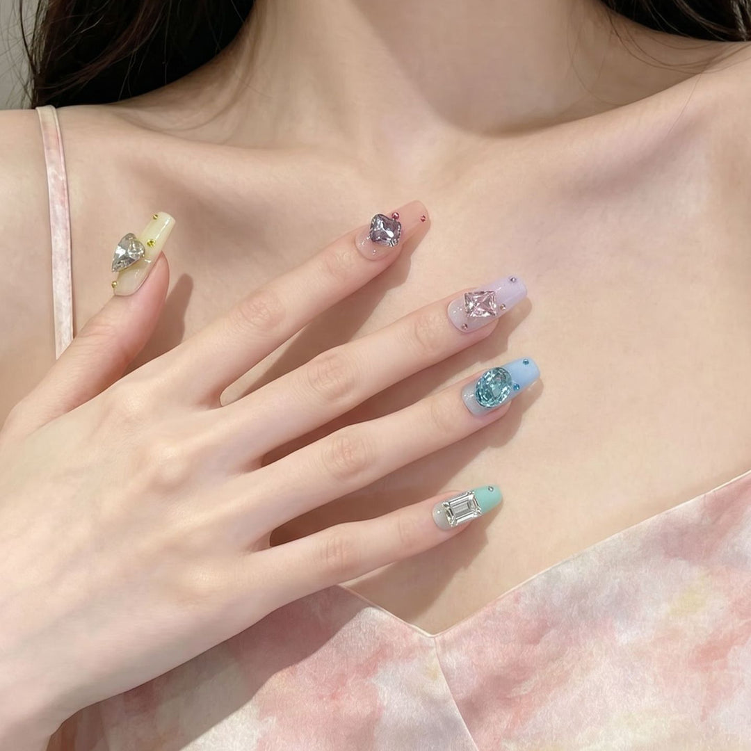 Artistic Press-On Nail Set with Gemstone Embellishments Bowlift