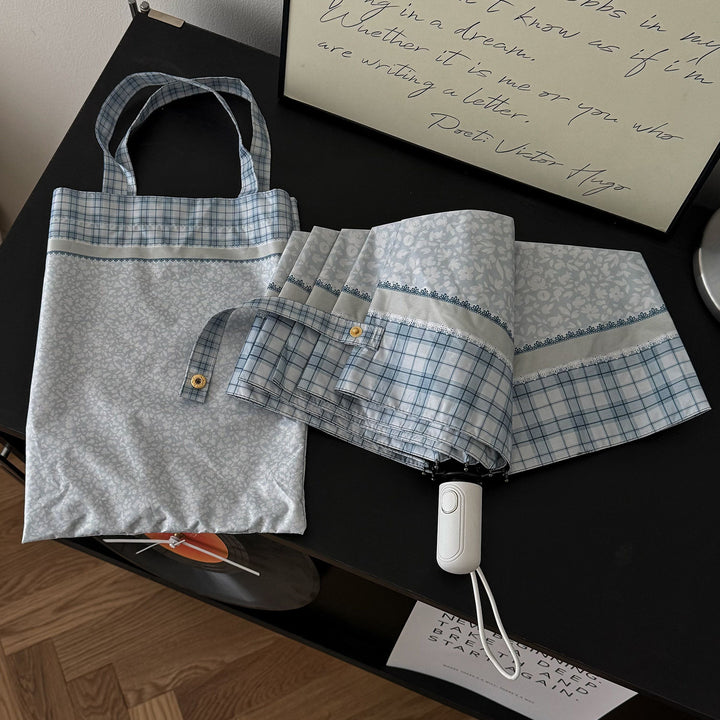 Women's tote bag with integrated folding umbrella Bowlift