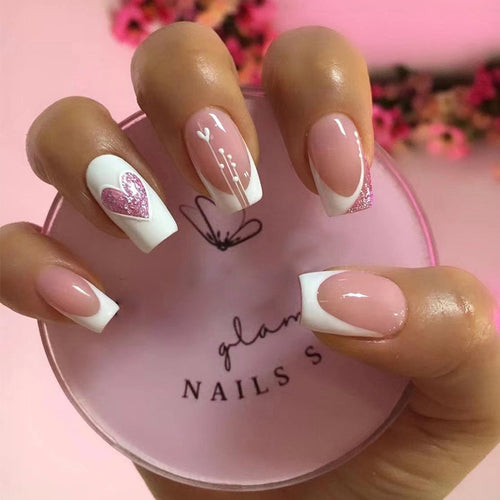 Artful nail designs with heart and glitter accents Bowlift