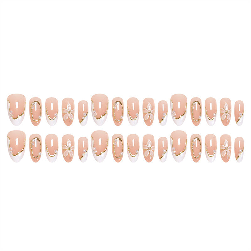Artistic nail tips with elegant pearl design Bowlift