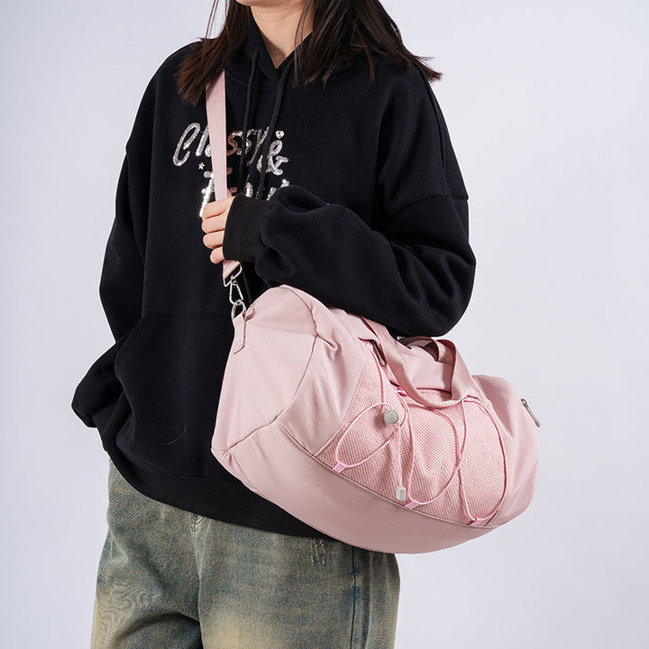 Sporty shoulder bag with adjustable carrying handles and breathable mesh material Bowlift