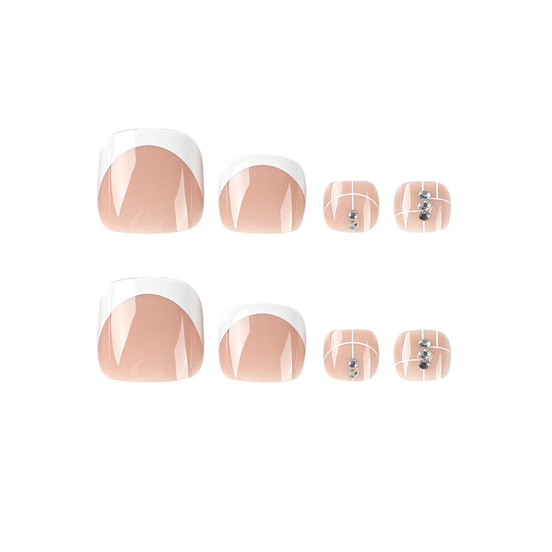 Artful toenail design with elegant style and rhinestone embellishments Bowlift