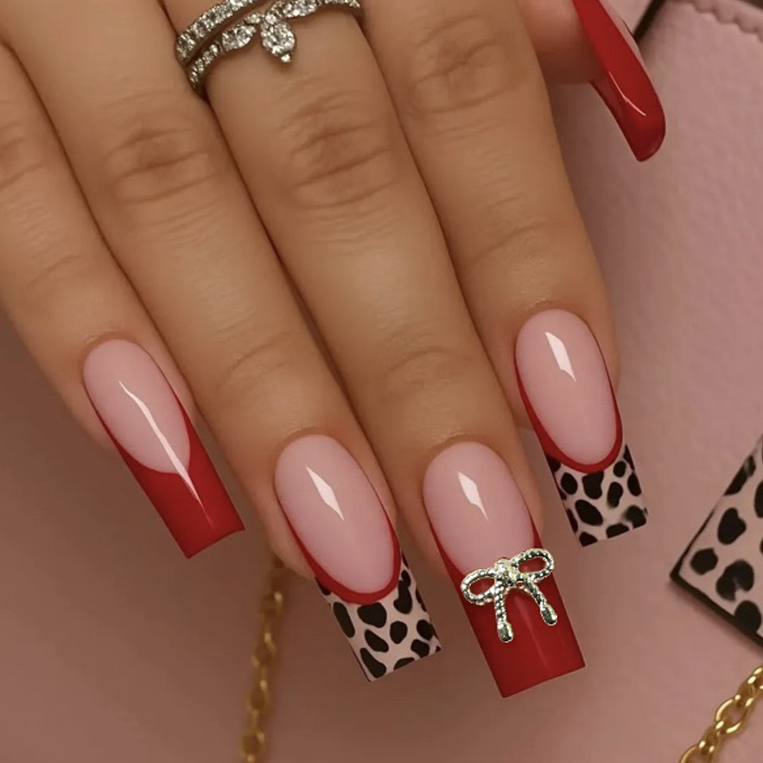 Stylish Acrylic Nail Extensions with Bow and Leopard Print Bowlift