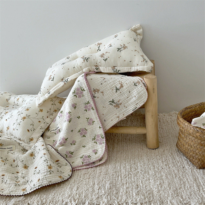 Unisex versatile muslin blanket with floral accents Bowlift