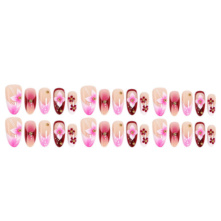 Artificial nails with floral designs and elegant details Bowlift