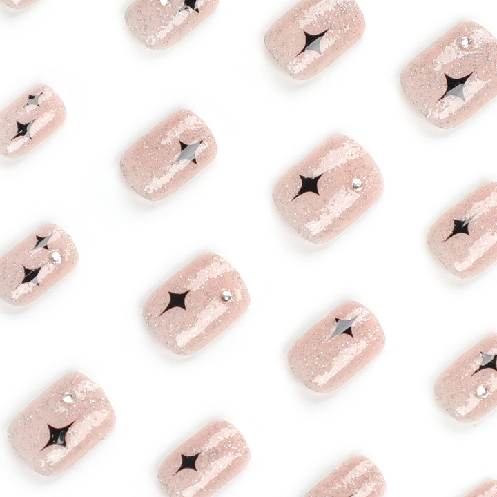 Artful Nail Extensions with Glitter and Star Pattern Bowlift