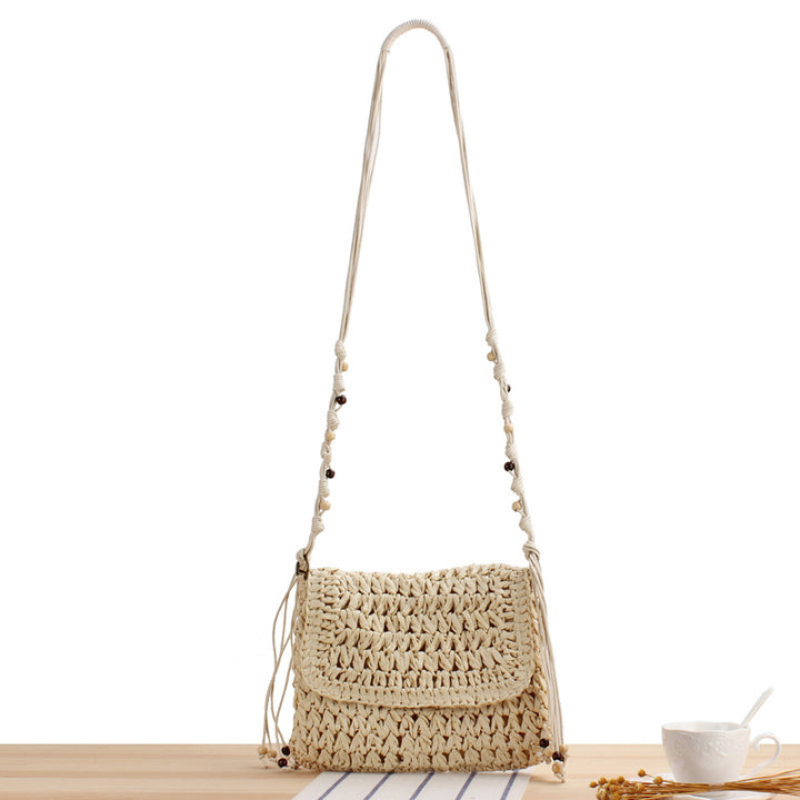 Braided Natural Material Handbag with Playful Fringes Bowlift