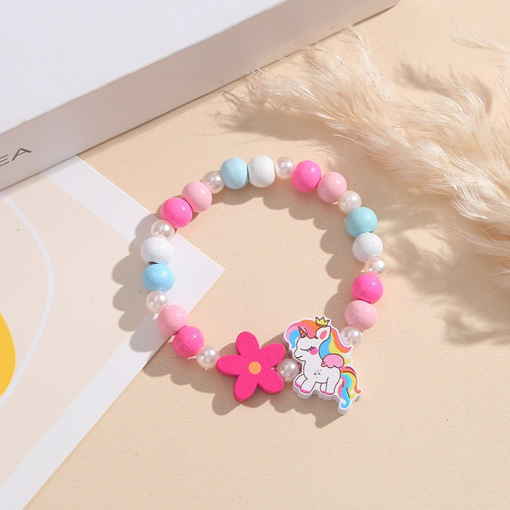 Playful children's bracelet with unicorn and flower motif Bowlift