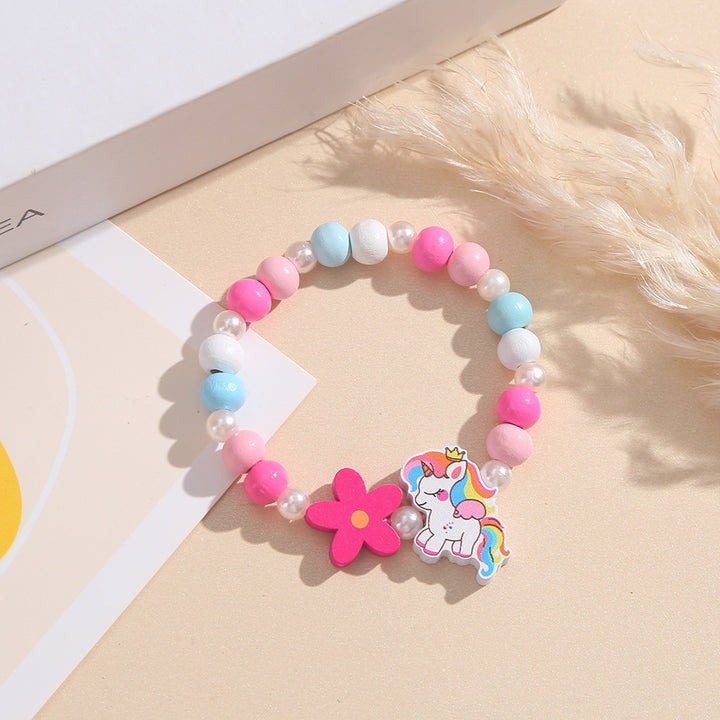 Playful children's bracelet with unicorn and flower motif Bowlift