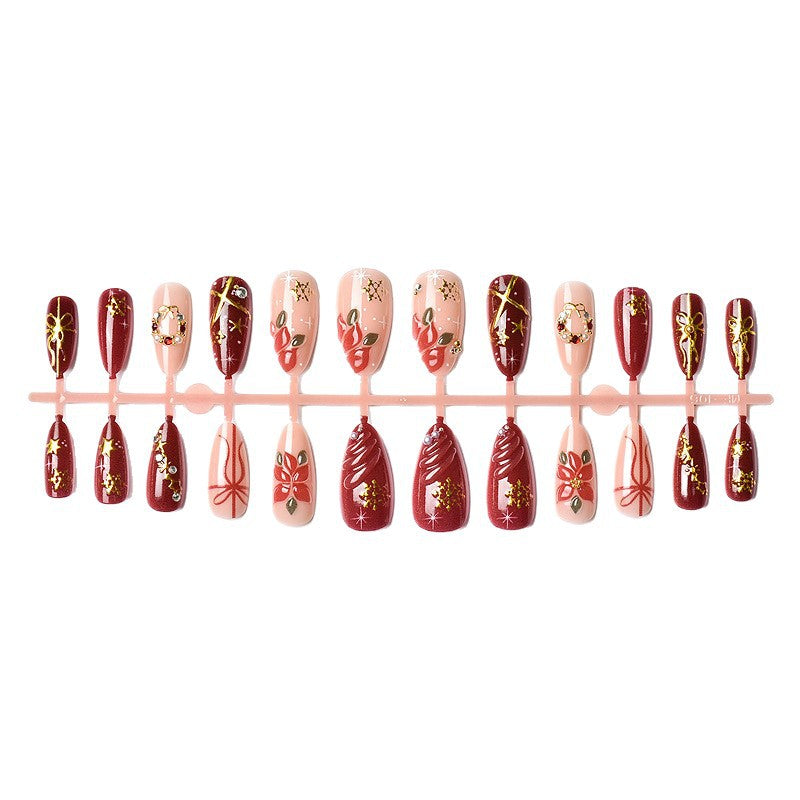 Artificial nail set in festive winter design with glamorous accents Bowlift