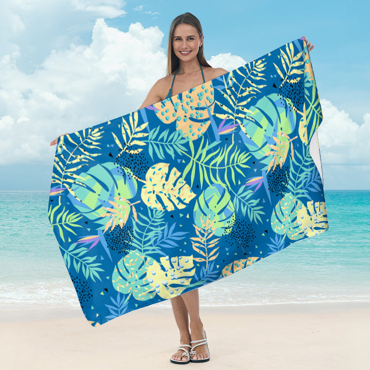 Beach towel with tropical palm leaf design Bowlift