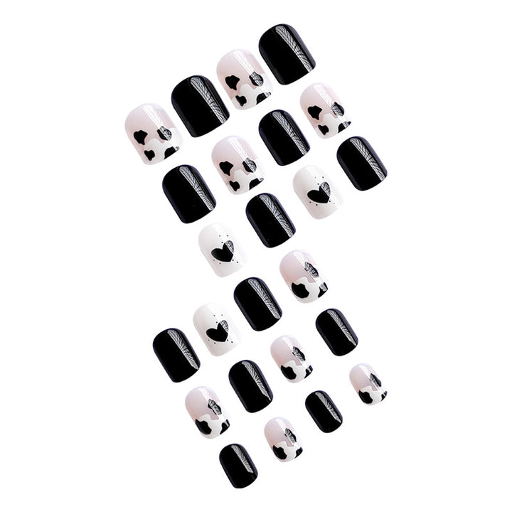 Creative nail art with heart and animal motifs Bowlift