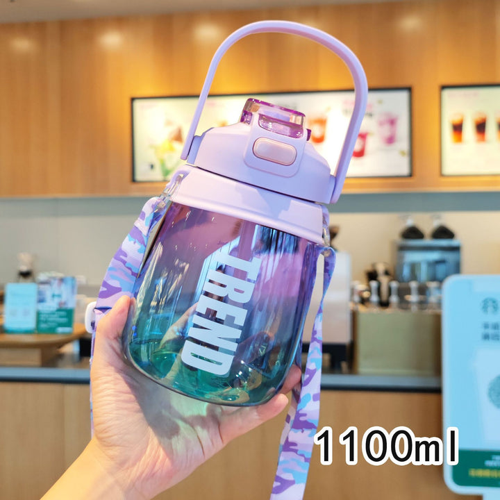 Women's multifunctional water bottle with safety closure and ergonomic carrying handle Bowlift