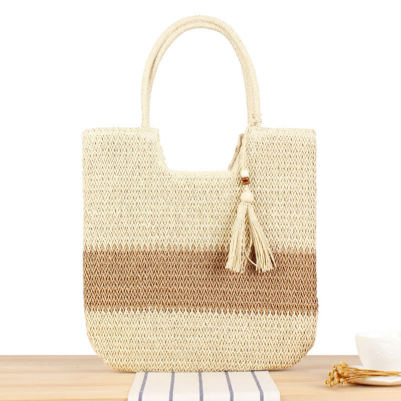 Elegant straw bag with practical tassels Bowlift