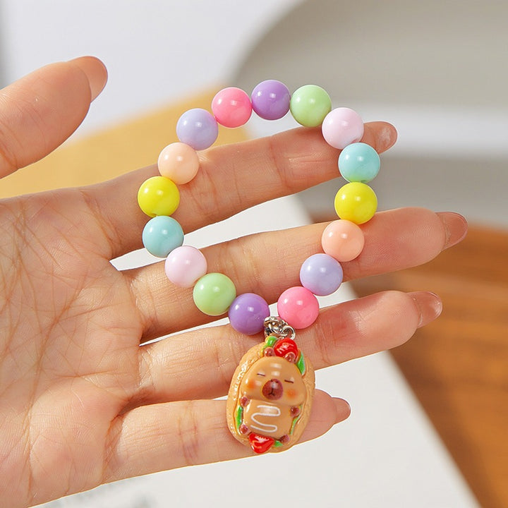 Colorful children's bracelet with crafted pendant Bowlift