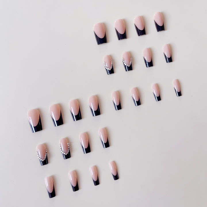 Artificial nail set with elegant tips and glitter accents Bowlift