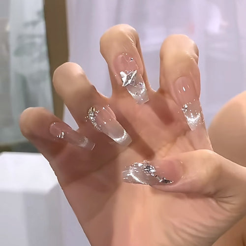 Creative artificial nails with cute animal motifs and elegant French tip design Bowlift