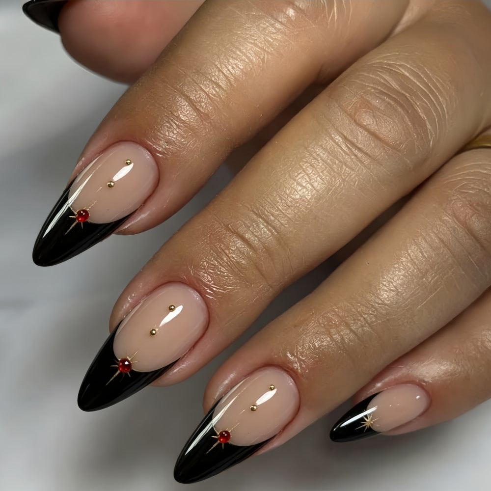Glamorous artificial nails in stylish stiletto design with golden accents Bowlift