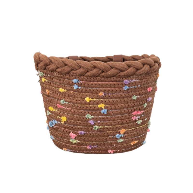 braided rope bike basket with pom pom embellishments and leather handlebar straps Bowlift