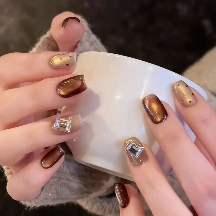 Acrylic nail set with elegant ombre designs and sparkling accents Bowlift