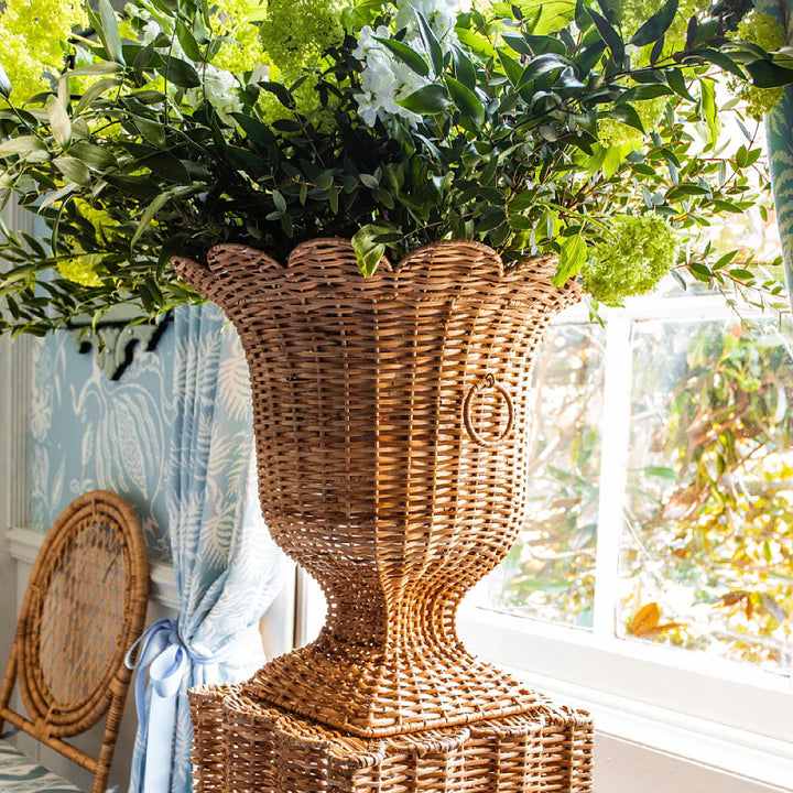 Decorative plant pot stand made of woven material Bowlift