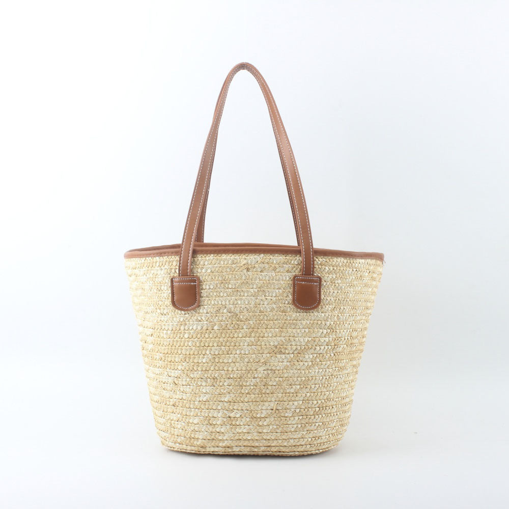 Braided basket bag with elegant leather handles Bowlift
