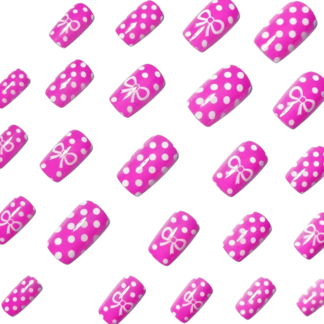 Artificial nails with romantic polka dot pattern and bow Bowlift