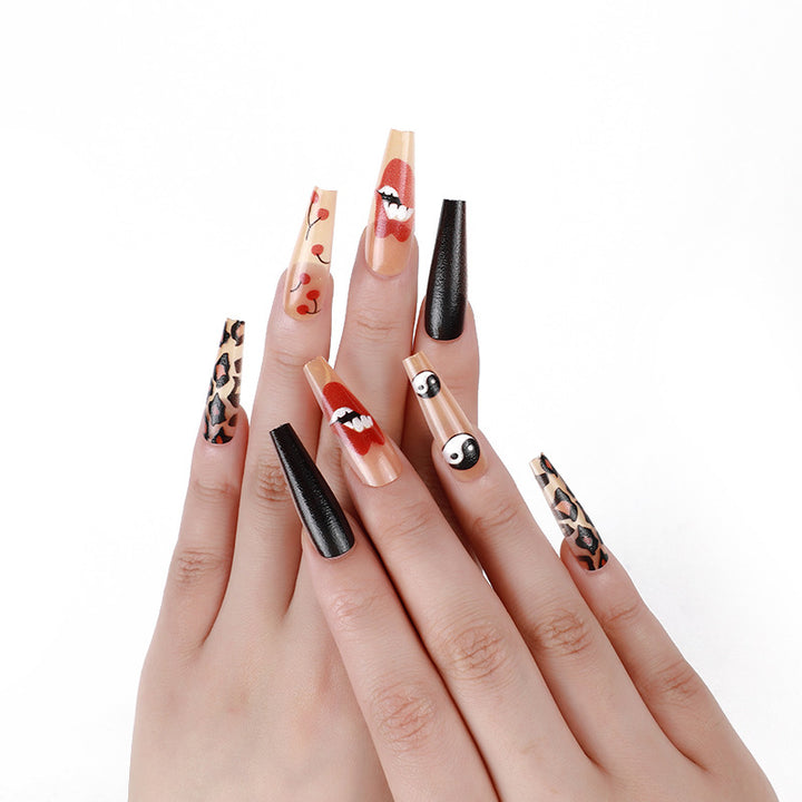 Artificial nails in creative designs with animal and face motifs Bowlift