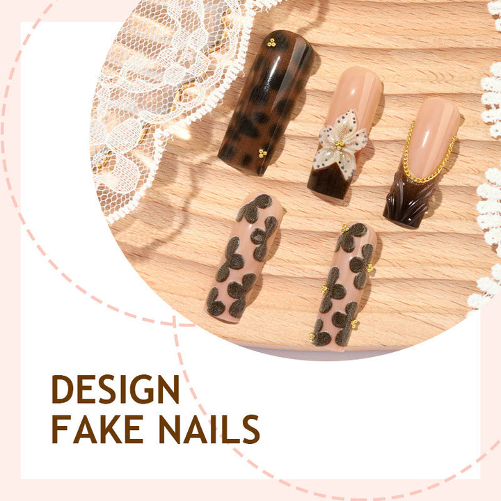 Nail design with floral accents and elegant details Bowlift