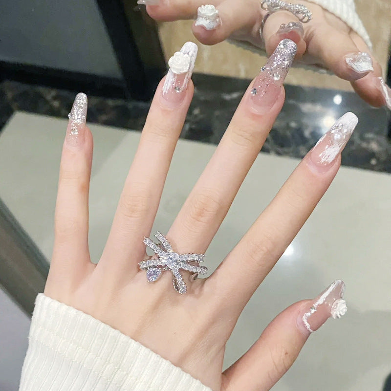 Acrylic nail set with elegant 3D flower and glitter decorations Bowlift