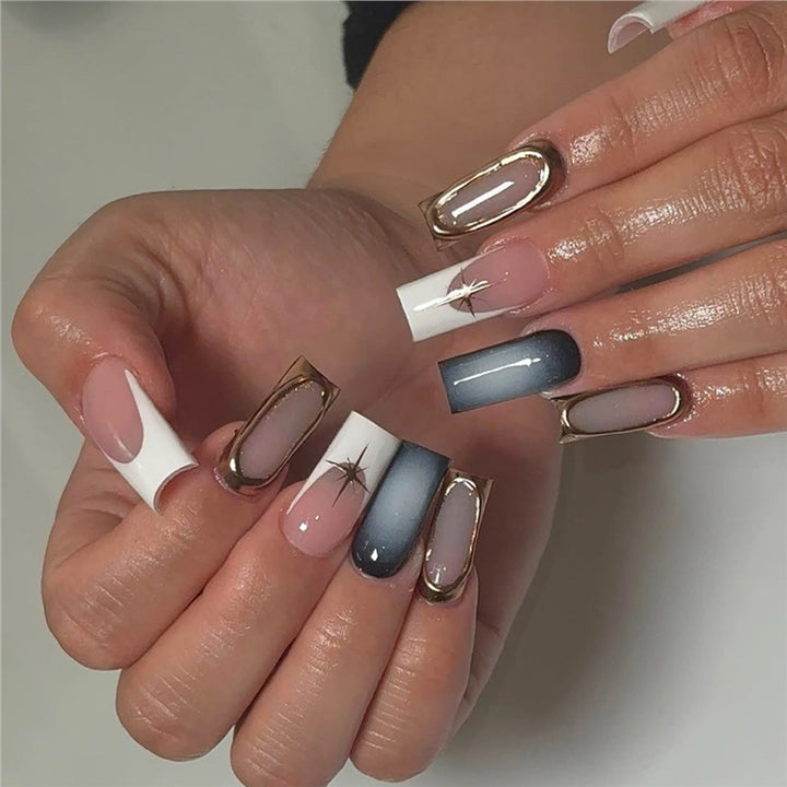 Elegant Stiletto Nail Extensions with Golden Accents Bowlift