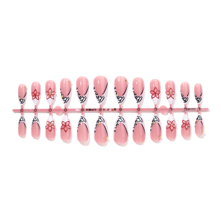 Artificial nail set with elegant ribbon and flower embellishments Bowlift