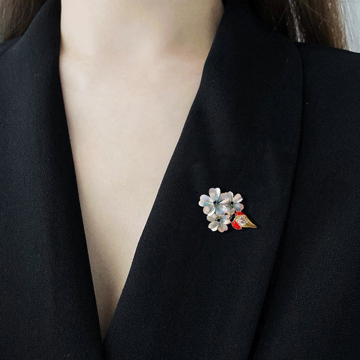 Flower brooch with ladybug and crystal Bowlift