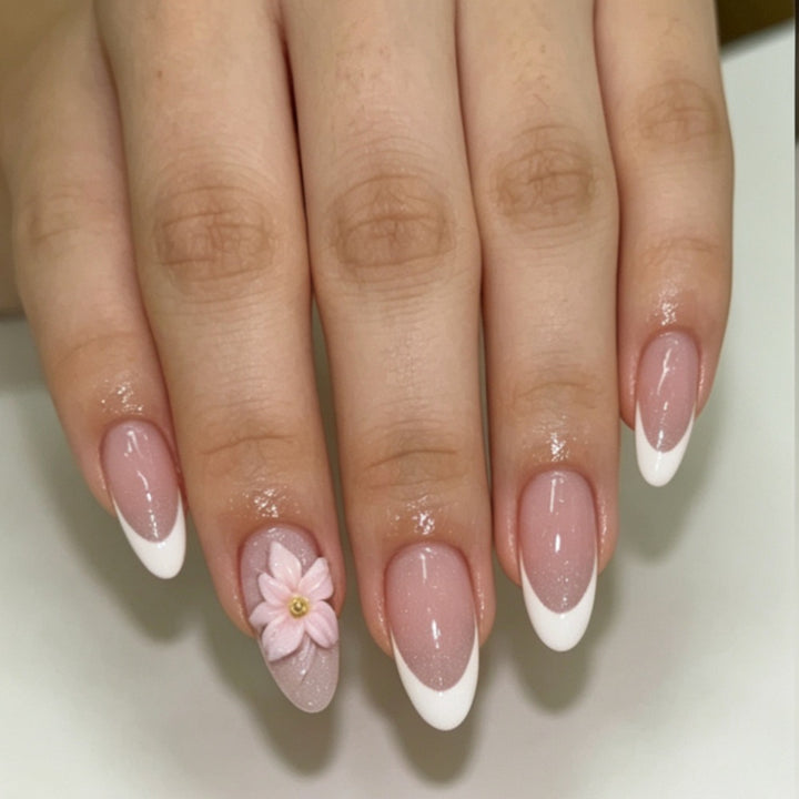 Artificial nails with floral decoration and elegant French tip design Bowlift