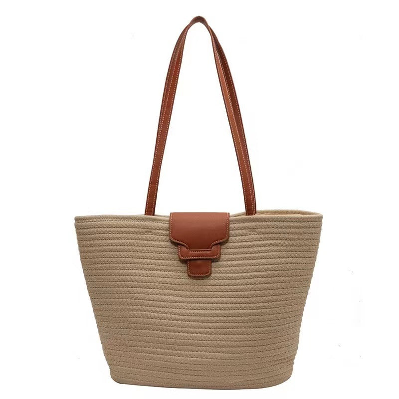 Large shoulder bag made of woven natural material Bowlift