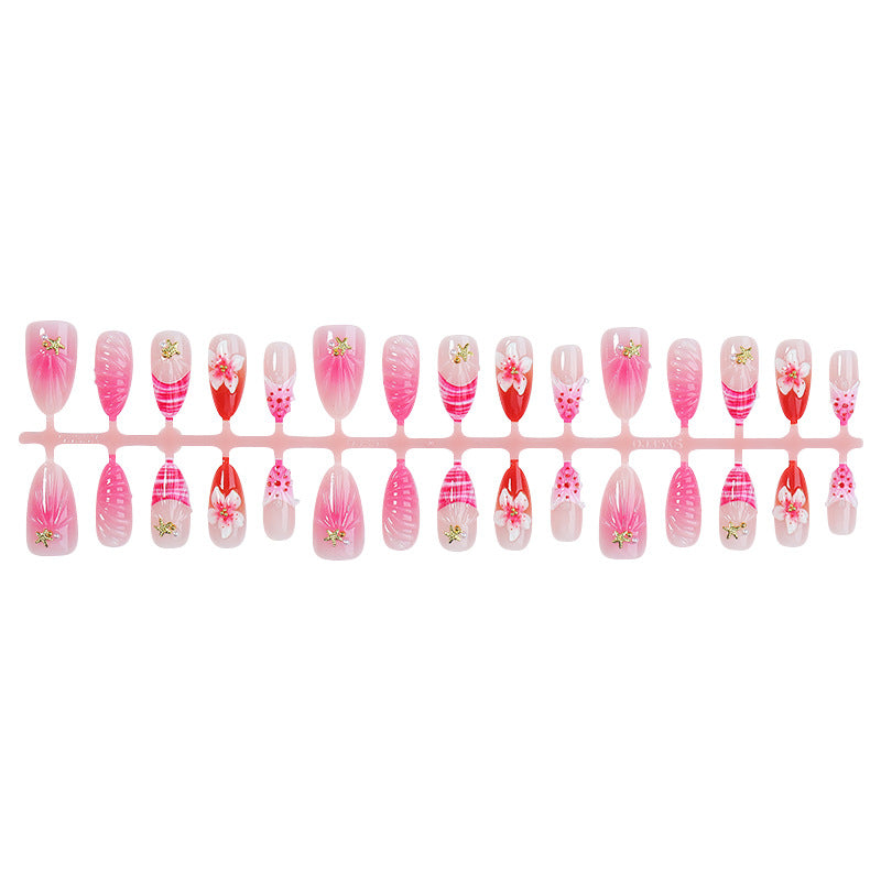 Artistic Press-On Nail Set with Floral and Decorative Accents Bowlift