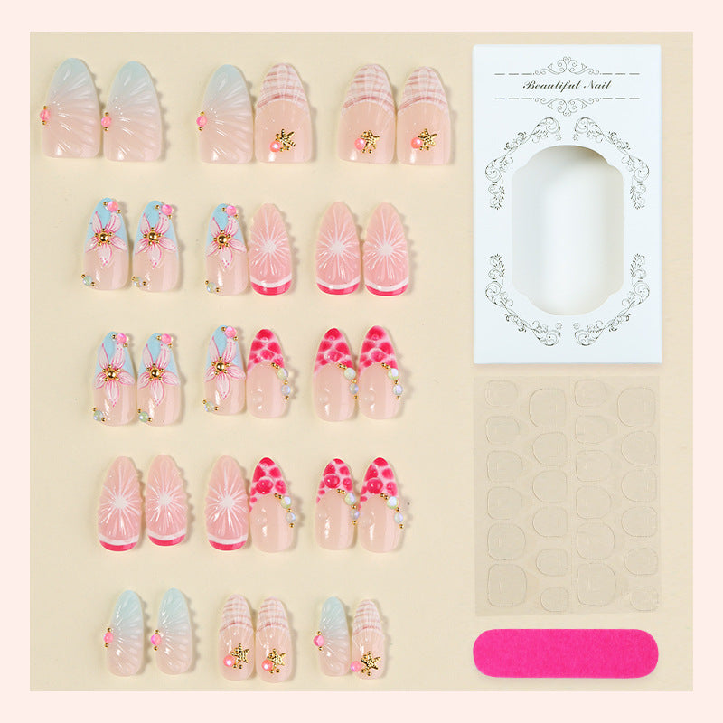 Creative nail art set with floral designs and decorative accents Bowlift