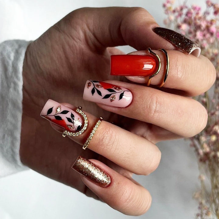 Artful Gel Nails with Elegant Floral Design and Glitter Accents Bowlift