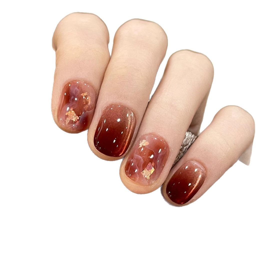 Artificial nails with elegant gradient and golden accents Bowlift
