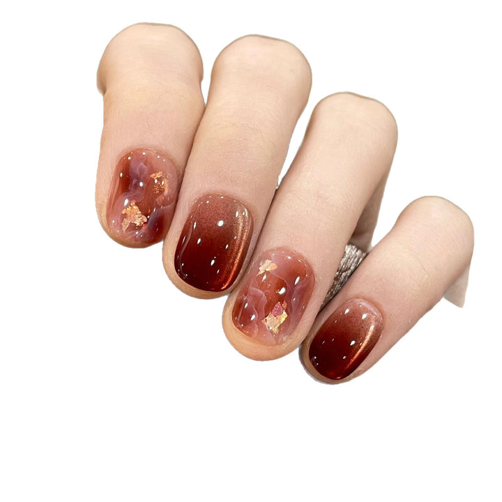 Artificial nails with elegant gradient and golden accents Bowlift