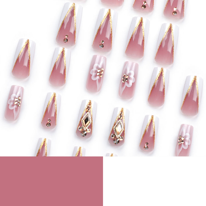 Artistic nail extensions with floral and glitter accents Bowlift