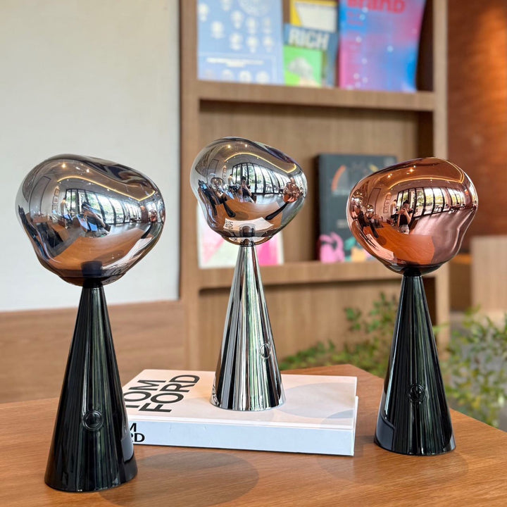 Modern mirrored sculptural table lamp with conical metal base Bowlift