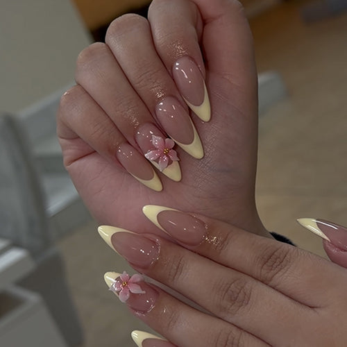 Artful stiletto nails with elegant flower accent Bowlift