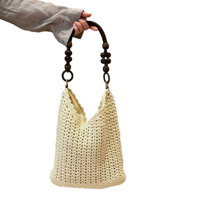 Hand-knotted bucket bag with wooden handles Bowlift
