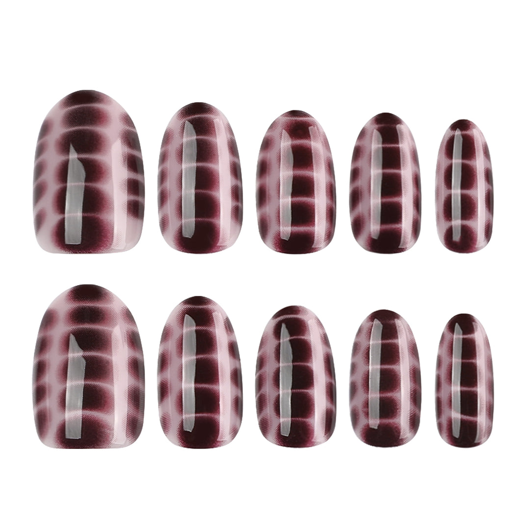 Artful nail art with snake motif Bowlift