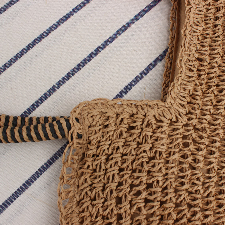 Handmade straw shoulder bag with structured design Bowlift