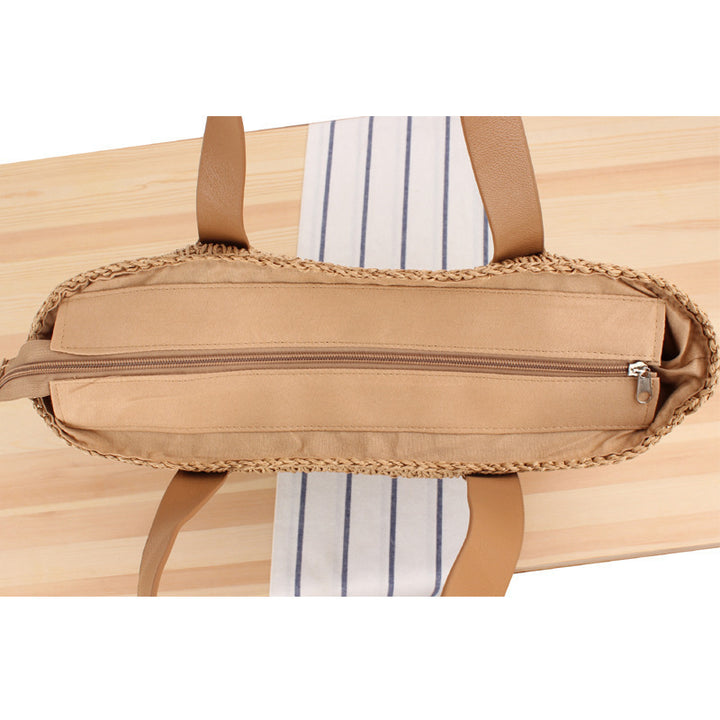 Spacious straw bag with elegant leather handles Bowlift
