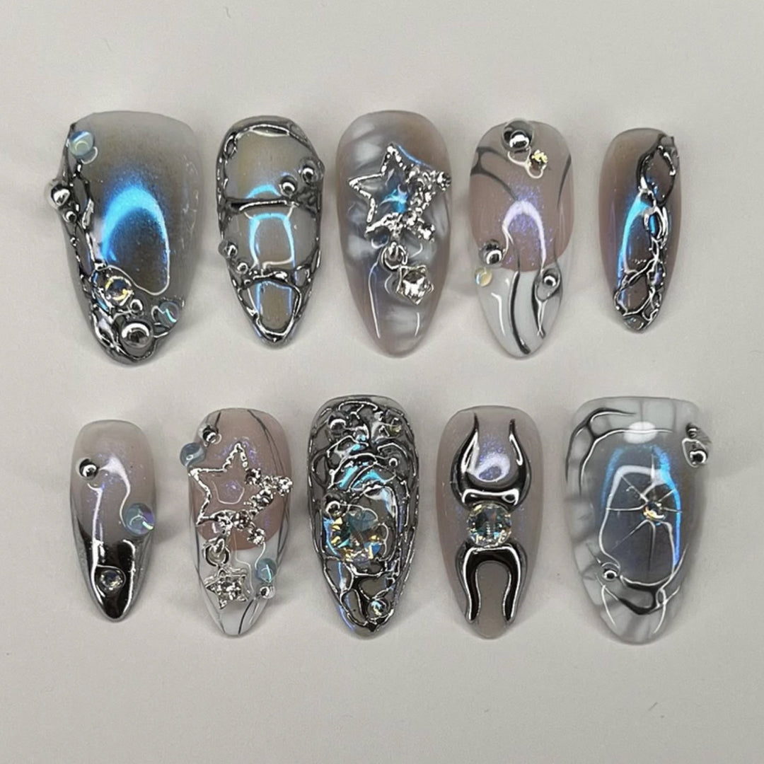 Artful Nail Extensions with Shiny Metal Accents Bowlift